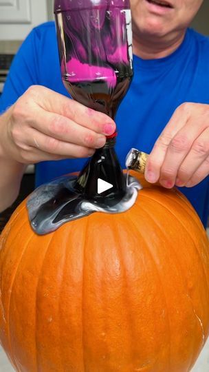 330K views · 7.1K reactions | My favorite way to decorate a Pumpkin | My favorite way to decorate a Pumpkin | By The Gooch | Let's give this a try. I'm just
using regular craft acrylic paint. I'm pouring them into a
Coke bottle with a cork in the end of it. Pour it in slowly
not to mix it up too much. Start with your base color
first and then your lighter colors and once you remove the
cork, look how amazing the marbling effect is on this
pumpkin. Once the pumpkin starts to dry, add on a few
more ounces of paint just to give it that extra 3D effect
and of course, don't forget to paint the stem of your pumpkin.
So, tell me what you think. How cool is that marbling effect? I
just love this. Remember folks, if I can do this, you can do
this. Pumpkin Paint Pouring, Medical Pumpkin Carving Ideas, Marble Pumpkins, Decorate A Pumpkin, Pumpkin Drinks, Amazing Pumpkin Carving, Marbling Techniques, Plastic Pumpkins, Candy Skulls