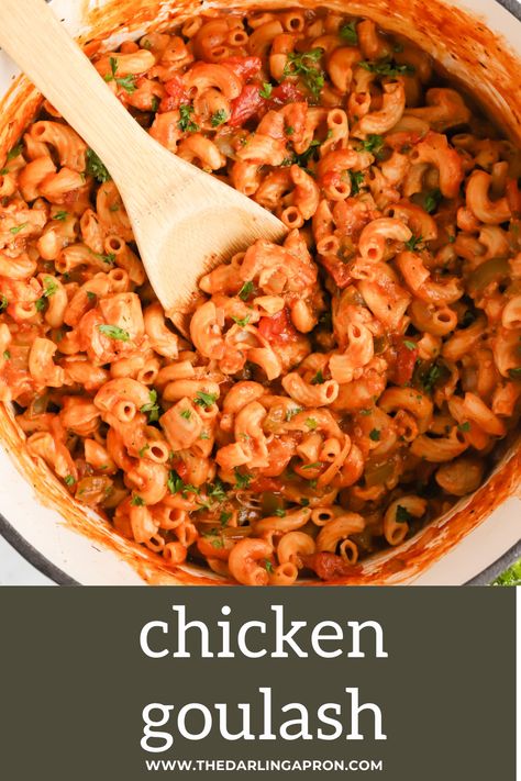 Overhead view of wooden spoon sitting in goulash in Dutch oven. Ground Chicken Goulash, Goulash Recipes Chicken, Ground Chicken Goulash Recipes, Chicken Goulash Recipes, Goulash With Tomato Soup, Goolosh Recipe, Chicken Chili Relleno Recipe, Chicken Goulash, Chicken Pasta Sauce