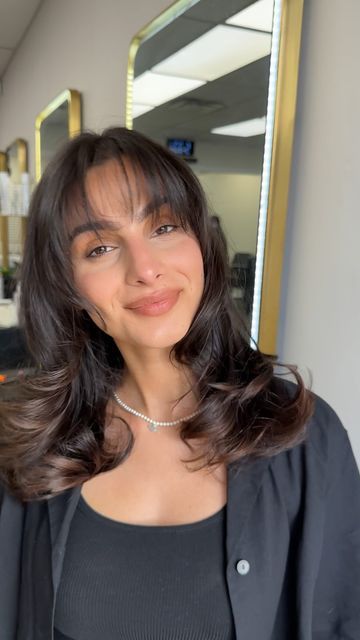 Amanpreet Dhandwar on Instagram: "Wispy bangs for the win✨ Navi wanted more volume and shorter curtain bangs that compliment her face shape! Products: @unite_hair elevate mousse @unite_hair smooth and shine @milbonusa texture spray #volume #bouncyhair #bangs #blowout #aesthetic #faceframe #brunette #hairgoals #hairsandstyle #hairsalon #brampton" 90s Bubble Bangs, Wispy Bangs Brunette, Brunette Wispy Bangs, Bubble Bangs, Shorter Curtain Bangs, Blowout Bangs, Blowout Aesthetic, Bangs Blowout, Brunette Fringe