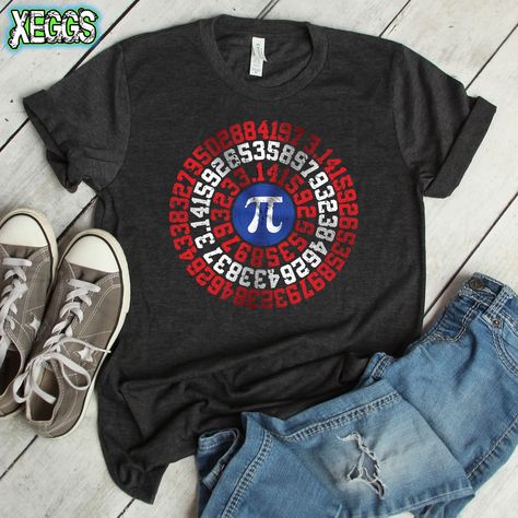 Captain Pi Shirt, Pi, Superhero, Pi Day, Math Shirt, Pi Shirt, American Flag, Math Teacher Gift, Math, Nerdy Gifts, Fourth of July Shirt This t-shirt is everything you've dreamed of and more. It feels soft and lightweight, with the right amount of stretch. It's comfortable and flattering for both men and women. ♦ Hoodies, sweatshirts, v-necks and youth sizes available upon request. :) * Bella+Canvas Unisex Style Tee. 100% Airlume combed and ring-spun cotton. - Heather Prism: 99% Cotton/1% polyes Pi Shirt, Pi Day Shirts, Funny Math Shirt, Math Shirt, Math Teacher Shirts, Math Shirts, Nerdy Gifts, Superhero Shirt, Fourth Of July Shirts