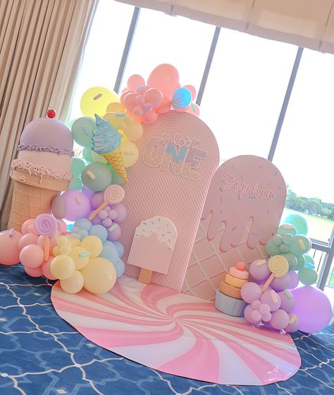 Sophia’s Sweet One 🍦🍬🍭 Backdrop + Balloons + decor @janettloveshop Bounce House + Ball Pit @bouncebrightparty #sweetone #sweetonetheme #sweetonebirthday #sweetonebackdrop #sweetoneballoons #sweetoneballoongarland #icecream #icecreamthemedparty #candyland #candylandtheme #candylandparty #firstbirthday #firstbirrhdayideas One Year Old Candy Land Theme Party, Life Is Sweet Party Theme, Sweet One First Birthday Balloons, Two Sweet Backdrop Ideas, Simple Two Sweet Birthday Cake, Sweet One First Birthday Balloon Arch, Sweet One Backdrop With Balloons, Sprinkle Birthday Theme, Ice Cream Theme Balloon Garland