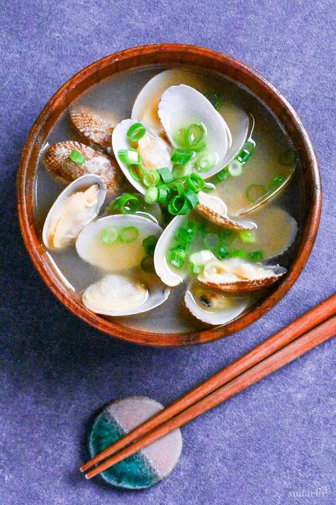 Asari clam miso soup in a wooden bowl on a dark gray background Clam Miso Soup, Miso Chilean Sea Bass Recipe, Steam Clams Recipe, Clam Soup, Steam Clams, Fresh Clams, Miso Soup Bowl Ceramic, Dark Gray Background, Steamed Clams