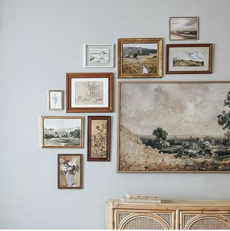 Gallery Wall With 1 Large Picture, Gilded Frame Gallery Wall, Old Fashioned Gallery Wall, Long Gallery Wall Ideas, Gallery Wall With Large Painting, Monochromatic Gallery Wall, Large Painting Gallery Wall, Gallery Wall With Vintage Art, Gold And Wood Frame Gallery Wall