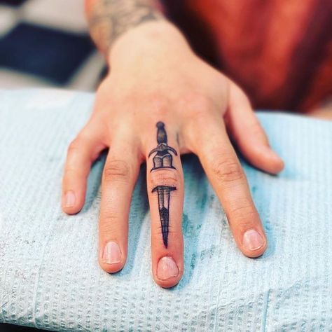 Knife Tattoo On Finger, Finger Knife Tattoo, Knife Finger Tattoo, Dagger Hand Tattoo, Dagger Finger Tattoo, Sleeve Filler Ideas, Tattoo Background Filler, Tattoo Sleeve Filler Ideas, Quotes Tattoo Ideas