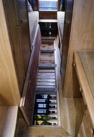 Wine storage for your RV - Wish I had this right now if just for an additional layer of insulation on the floor. Check out the website to see more Trailer Storage, Floor Storage, Vw Lt, Rv Organization, Camper Storage, Rv Storage, Boat Interior, Remodeled Campers, Vintage Trailers