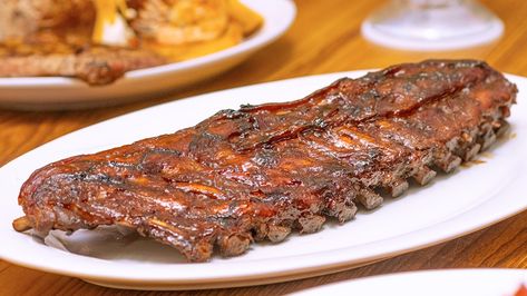 Texas Roadhouse Makes Their BBQ Ribs In 3 Easy Steps - Tasting Table Texas Roadhouse Ribs Recipe, Texas Roadhouse Ribs, Baby Back Pork Ribs, Bbq Tips, Bbq Hacks, Homemade Barbecue Sauce, Barbecue Ribs, 15 Birthday, Ribs Recipe