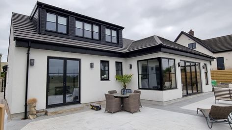 20230606_150806 White House With Stone, Black Aluminium Windows, Tile Patio, Outdoor Tile Patio, Black Window Frames, Wooden Cladding, Outdoor Tile, Grey Windows, Self Build Houses