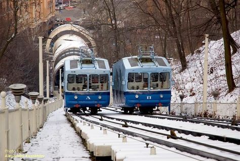 The Kiev funicular is one of the main attraction of the city with a long history. This is an unusual means of transportation - a simple carriage that goes up and down a steep slope using a rope pull. Actually, the word "funicular" is translated from Latin as a cable car, and the first name of the Kiev funicular is "Mikhailovsky electric cable car." Today the funicular is very popular among the guests of the capital, but initially, this type of transport had nothing to do with an "attraction". Land Mark, Rail Transport, Russian Empire, Kiev Ukraine, Cable Car, Cable Cars, Main Attraction, First Name, St Michael