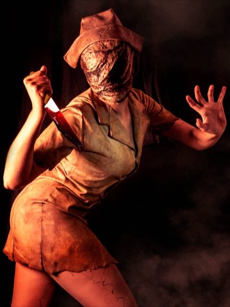 Perfect for Halloween, this creepy look features a distressed, bloodstained outfit, faceless mask, and a menacing pose with a knife in hand. Get ready to terrify everyone at the party with this spine-chilling horror ensemble!
#SilentHill #HalloweenCostume #HorrorCosplay #NurseCosplay #CreepyVibes #SpookySeason #HalloweenHorror #CosplayArt Silent Hill Costume, Silent Hill Nurse Costume, Nurse Games, Horror Vibes, Nurse Cosplay, Silent Hill Nurse, Zombie Nurse, Sister Costumes, Nurse Dress