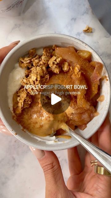 Jess Bippen, MS, RD on Instagram: "APPLE CRISP YOGURT BOWL // cinnamon baked apples, paired with peanut butter, granola and yogurt for a cozy fall flavored high protein breakfast (or snack).   Having protein-rich foods paired with carbohydrates allows for more staple blood sugar. Stable blood sugar is the foundation for balanced hormones.   - organic Greek yogurt (@wallabyyogurt) - baked cinnamon apples (recipe below) - favorite granola (@purely_elizabeth) - peanut butter  For the baked apples: 2 1/2 lbs apples (about 5 large or 10 small) 1/4 cup water 2 tablespoons lemon juice 1 tbsp cinnamon  Oven method (crockpot method on my website): Preheat the oven to 350F. Cut into 1/4 inch thick slices. Place in a lidded baking dish or dutch oven. Add the water, lemon juice, and cinnamon. Toss tog High Protein Fall Breakfast, Fall Yogurt Bowls, High Protein Fall Recipes, Apple Yogurt Bowl, Apple Greek Yogurt, Yogurt Bowl Ideas, Cinnamon Apples Recipe, Cinnamon Baked Apples, Granola And Yogurt