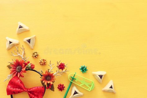 Purim celebration concept jewish carnival holiday over yellow wooden background. , #AD, #carnival, #holiday, #yellow, #jewish, #Purim #ad Purim Celebration, Carnival Holiday, Celebration Images, Purim, Deer Antlers, Infographic Design, Antlers, Floral Decor, Deer