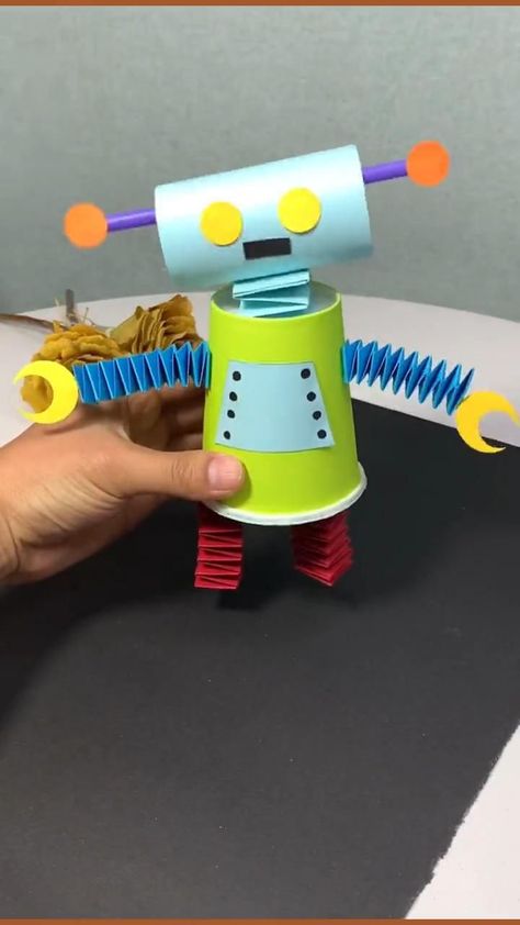 DIY Robotics Crafts To Make With The Kids | Paper crafts, Kids' crafts, Toddler arts and crafts Arts And Crafts Paper, Kids Paper Crafts, Paper Cup Crafts, Robot Craft, Crafts For Kids Easy, Toddler Arts And Crafts, Hand Crafts For Kids, Diy Paper Crafts Decoration, Diy Crafts For Kids Easy