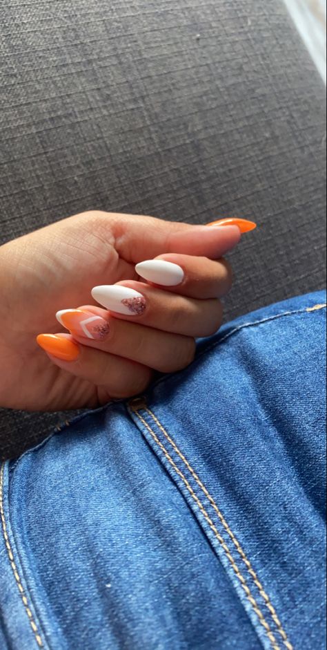 White Nails With Orange Heart, White Nails With Orange Glitter, Orange And White Almond Nails, Orange And White Nails Ideas, White With Orange Nails, Orange Graduation Nails, White And Orange Nail Designs, Orange Nails Almond Shape, White Orange Nails