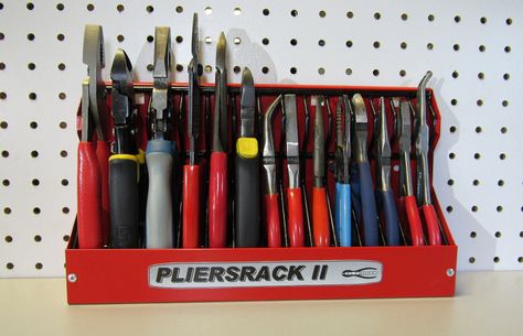 Pliers are tricky things to store. They don't lend themselves to pegboad, as wedging them into a hook by their crotches is defeated by simple gravity. If you obey gravity and store them flat in a drawer, their awkward splay-handled shape takes up an undue amount of space, and they Garage Hacks, Socket Organizer, Garage Tool Organization, Tool Board, Magnetic Tools, Tool Box Organization, Tool Rack, Tool Organizers, Learn Woodworking