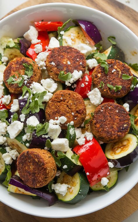 Discover the ultimate Mediterranean Salad that's perfect for a crowd! Our Mediterranean Roasted Vegetable and Falafel Salad is a vibrant blend of flavors, making it a standout choice for Mediterranean salad ideas. Enjoy roasted veggies, crispy falafel, and a zesty dressing in this delicious dish! Salad With Falafel, Healthy Falafel Recipe, Mediterranean Dips, Mediterranean Salads, Mediterranean Salad Recipe, Mediterranean Appetizers, Falafel Salad, Falafel Recipe, Mediterranean Meals