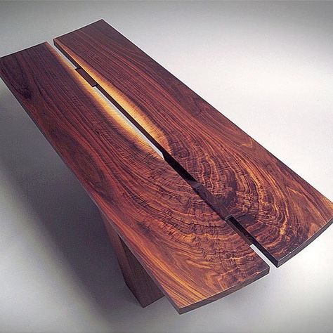 Really dig this George Nakashima inspired cantilevered coffee table by Dave Boykin, thinking I might make one for my homestead when I finish this colossal cabinet on stand build. Possibly a couple of end tables to go with it. Finding a slab like that will be next to impossible but it'll be fun searching... #woodworking #georgenakashima #coffeetable Crib Woodworking Plans, Jet Woodworking Tools, Garage Furniture, Woodworking Desk, Woodworking Storage, George Nakashima, Woodworking Basics, Woodworking Logo, Woodworking Box