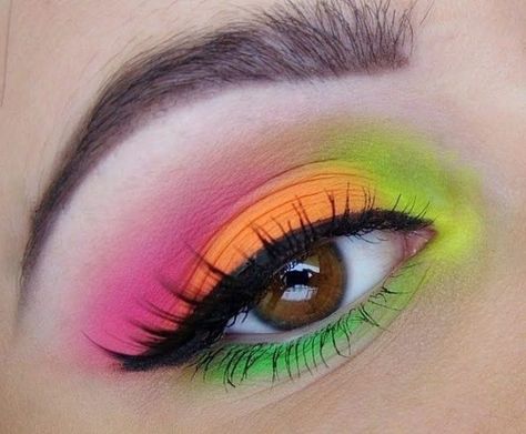 brown-eye-seen-in-extreme-close-up-and-decorated-with-eyeshadow-in-four-neon-hues-pink-orange-yellow-green-black-mascara-and-eyeliner Makeup Looks Brown, Trendy Eye Makeup, Makeup Verde, Carnaval Make-up, Neon Eyeshadow, Festival Makeup Glitter, Neon Makeup, Eyeshadow For Brown Eyes, Bright Makeup