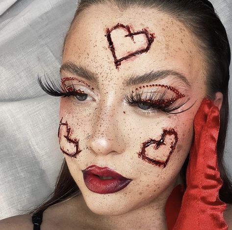 Bloody valentines inspired makeup look using heart prosthetics and special effects makeup. Queen Of Hearts Halloween Makeup Scary, Sunken Face Makeup, Simple Blood Makeup, Special Effects Makeup Horror Easy, Gore Makeup Tutorial, Zombie Gore Makeup, Pretty Sfx Makeup, Killer Makeup Looks, Special Effects Halloween Makeup