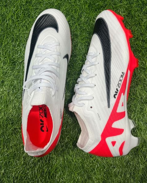 Dominate the field with the Nike Mercurial Zoom Vapor 15 Elite Football Boots in White & Red. Designed for men and crafted from durable PU material, these boots offer exceptional traction and stability on firm ground surfaces. The secure lace-up closure and easy maintenance make them ideal for intense play. Available exclusively at Sports Baazar, these boots ensure unmatched speed, agility, and control. Cool Football Boots, Nike Football Boots, Red Crafts, Nike Cleats, Futsal Shoes, Soccer Boots, Football Equipment, Nike Mercurial, Nike Football