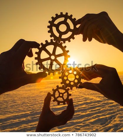 Four hands collect the gear from the gears of the details of the puzzles. against the background of sunlight. Concept business idea. Teamwork Meaningful Pictures, Leader In Me, Steel Fabrication, Vision Board Pictures, Website Images, Business Idea, Four Hands, Stock Pictures, Teamwork