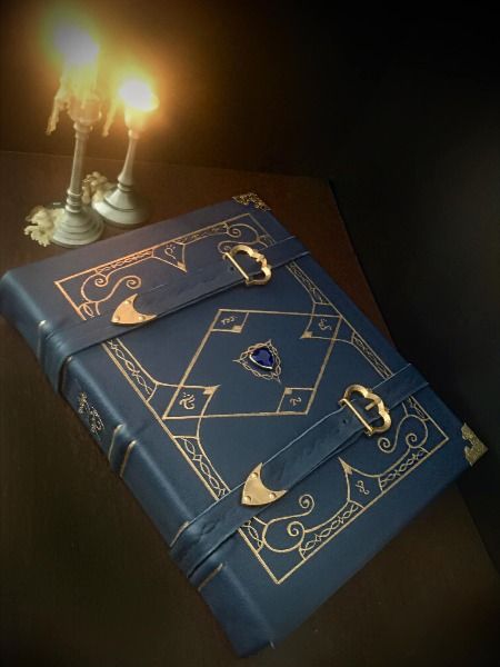 (@bywaterbookbindery on Instagram) Handmade traditional bookbinding D&D Dungeons and Dragons Elvish Wizard's spellbook calligraphy with spell descriptions 5E handwriting heavy leather grimoire Wizard Spellbook, Dnd Spellbook, Dnd Paladin, Dnd Wizard, Leather Book Covers, Magick Book, Witch Books, Custom Journals, Magic Aesthetic