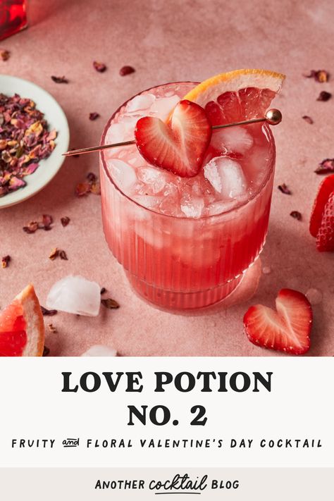 Raise you glass and get romantic with this refreshing love potion cocktail made with a mesmerizing blend of grapefruit juice, strawberry puree and sweet hibiscus syrup. Make this for your special someone this Valentine's Day, or share it with friends at your Galentine's celebration. Valentines Drink Photography, Part Time Lover Cocktail, Love Potion Drink Cocktails, Love Themed Cocktails, Strawberry Puree Cocktail, Breakup Cocktails, Valentines Day Mocktail, Drink Content Ideas, Galentines Cocktails Drink Recipes