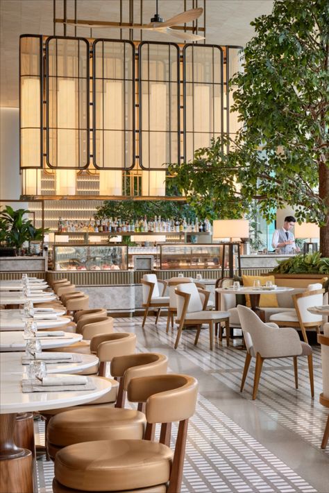 The 7.3m-high ceiling affords a panoramic view of the ocean while fans suspended from the high ceiling take inspiration from the verandas of the famous Repulse Bay Hotel. Bespoke screens, woven finishes, and abaca sheer blinds were commissioned for the space, inspired by the overarching nautical influence. Photography by Owen Raggett. #ArchitectureAndDesign #HospitalityDesign #ResortDesign #LuxuryResort #LuxuryHospitality#FullertonOceanPark #HongKong #FullertonStories #FullertonHotels Restaurant Interior Design Modern, Luxury Hotel Lobby, Boho Restaurant, Hotel Lobby Lounge, Hotel Restaurant Design, Luxury Hotels Lobby, Restaurant Design Inspiration, Modern Restaurant Design, Hotel Lounge