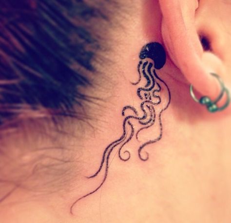 My tiny jellyfish tattoo! Behind the ear Octopus Tattoo Behind Ear, Jellyfish Neck Tattoo, Jellyfish Tattoo Behind Ear, Tiny Jellyfish Tattoo, Jellyfish Tattoo On Ankle, Two Jellyfish Tattoo, Jellyfish Tattoo On Side, Tentacle Tattoo, Squid Tattoo