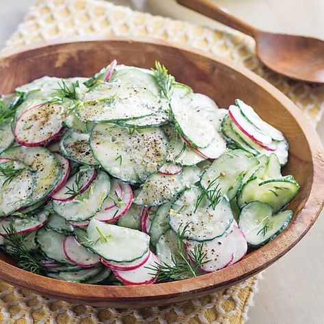 Cool, crunchy, and herbaceous, this Creamy Cucumber and Radish salad coated in a tangy buttermilk dressing will be a hit during the warm-weather months. Cucumber And Radish Salad, Cucumber Dressing, Creamed Cucumbers, Buttermilk Dressing, Paula Deen Recipes, Creamy Cucumber Salad, Radish Salad, Creamy Cucumbers, Strawberry Cake Recipes