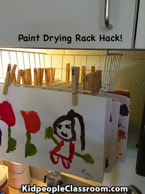 Kiddos get to paint more since it is so quick and easy to put up to dry. Check out tips in post. Kidpeople Classroom: Paint Drying Rack Hack! Classroom Art Drying Ideas, Diy Classroom Drying Rack, Drying Rack For Art Work, Classroom Drying Rack Ideas, Pre K Hacks, Diy Art Drying Rack Classroom, Paint Drying Rack Diy, Preschool Classroom Hacks, Art Drying Rack Diy