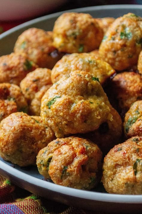 Keto Chicken Meatballs are your favorite ground chicken meatballs made with everyday ingredients but without the breadcrumbs.  Loaded with spices, parmesan cheese and fresh herbs, these Keto Chicken Meatballs are low-carb, gluten free and keto friendly but you would never even know it! | A Wicked Whisk #chickenmeatballs #ketochickenmeatballs #lowcarbchickenmeatballs #ketochickenmeatballslowcarb #ketochickenmeatballsbaked #ketochickenmeatballsglutenfree #lowcarbchickenmeatballshealthy Chicken Cheese Meatballs, Bariatric Chicken Meatballs, Chicken And Cheese Meatballs, Keto Recipes Using Ground Chicken, Low Carb Meals Ground Chicken, Ground Chicken And Pork Meatballs, Keto Chicken Cheese Balls, Low Sodium Chicken Meatballs, Low Carb Recipes With Ground Chicken