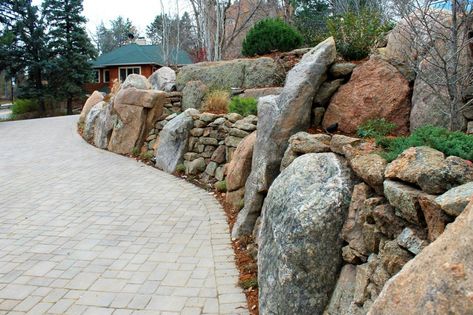 Boulder retaining walls, paver driveway Diy Stone Retaining Wall, Rock Wall Landscape, Boulder Retaining Wall, Backyard Retaining Walls, Rock Retaining Wall, Landscaping On A Hill, Garden Retaining Wall, Mulch Landscaping, Landscaping With Boulders