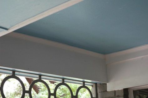 What is haint blue? Learn why so many homeowners paint their porch ceilings this color Light Blue Ceiling, Haint Blue Porch Ceiling, Blue Porch Ceiling, Camper Lights, Best Blue Paint Colors, Blue Ceiling, Haint Blue, Porch Paint, Blue Ceilings