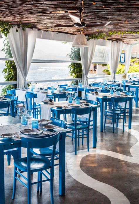 Blue Tables, Italian Restaurant Interior, Greek Interior Design, Greek Cafe, Luxury Cafe, Blue Patio, Coffee Shop Interior Design, Greece Hotels, Greek Restaurants