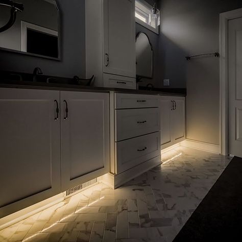 Bathroom toe kick lighting. By utilizing a very warm (2200k) linear led light source with a frosted lens ambiance and night lighting is achieved! Place even and reflected grazing the floor for perfect eye adaptation.  #LightingServices #InteriorLighting #LEDLighting #ResidentialLighting #ToeKickLighting Toe Kick Lighting, Bathroom Night Light, Kitchen Lighting Design, Led Under Cabinet Lighting, Ambiance Lighting, Apartment Makeover, Motion Lights, Cove Lighting, Lighting Plan