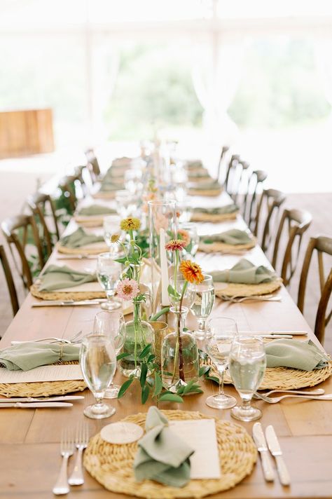 Rustic wedding reception tablescape with wicker chargers and sage green napkins. Rustic chic summer wedding inspo. Rustic Chic Table Setting, Sage Green Napkins, Wicker Chargers, Green Table Settings, Summer Wedding Photos, Sun Valley Idaho, Reception Tablescapes, Green Napkins, Green Themed Wedding