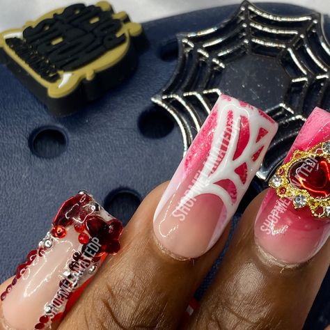 "If you know, you know, we are coming in HOT HOT HOT this spooky szn! Ain't nothing more spiderwebs so give the competition a scare with your very own \"Full Moon\" press on nails! We have got a junkie pink, V- shaped frenchies overlayed with some bloody red airbrush, topped all off with some spiderwebs and charms! YEAHHH eat it up and get your set now! The package includes a cuticle pusher, nail glue, and nail file all for prep and instructions on the back of the custom set of nails!" White V Tips, Halloween Nails White, Red Aura Nails, Spider Web Nails, Moon Spider, Web Nails, Nail Display, Oil Dropper, Red Aura