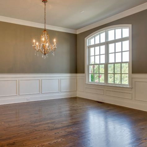 Partners in Building on Instagram: “NASHVILLE - Classic wainscoting and an arched window add depth and interest to this dining space, creating a beautiful, traditional…” Arched Window Treatments, Relaxing Living Room, Vaulted Ceiling Living Room, Bedroom Color Combination, Wainscoting Styles, Dining Room Windows, Interior Staircase, Modern Rustic Homes, Dining Room Remodel