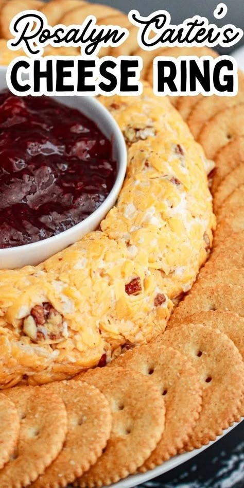 This famous Rosalyn Cater's Cheese Ring recipe features a pecan and cheddar cheese ring with a strawberry jam preserve in the middle and crackers served around it. A classic appetizer recipe that was a favorite among many recipes that were passed down by the former First Lady Rosalyn Carter, known for being a wonderful humanitarian, dedicated spouse, mom and grandmother. Strawberry Cheese Ring, Pecan Cheddar Cheese Ring With Strawberry Preserves, Cheddar Cheese Ring With Strawberry Jam, Rosalynn Carter's Cheese Ring, Pecan Cheddar Cheese Ring, Rosalyn Carter's Cheese Ring, Roslyn Carter Cheese Ring, Cheese Ball With Strawberry Preserves, Cheese Rings Recipe