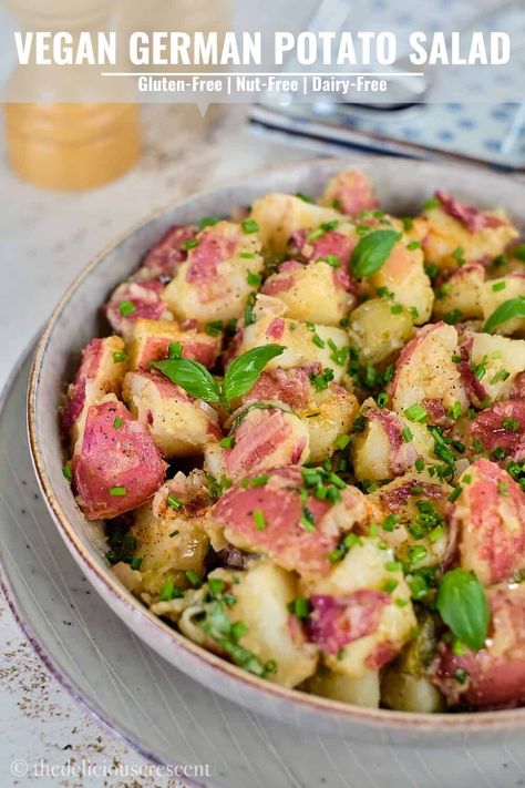 This vegan German potato salad made with red potatoes, shallots, dill pickles and herbs is tossed with a vinegar and mustard based dressing. Warm and delicious, this is a nice change from the usual salads. A no-mayo potato salad recipe that is healthy, easy and without bacon. #potatosalad #germanrecipe #veganpotatosalad Vegetarian Barley Soup, German Potato Salad Recipe, Potato Salad Dill, Dill Potatoes, Warm Potato Salads, Red Potato Salad, Vegan Potato Salads, German Potato, German Potatoes