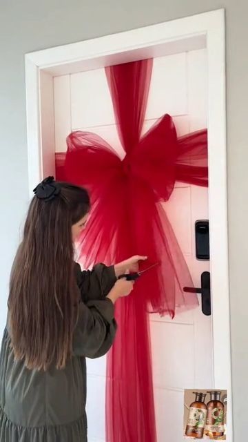 Cute Christmas Outdoor Decor, Simple Christmas Decor For Office, Easy Apartment Christmas Decor, Inexpensive Ways To Decorate For Christmas, Cabinet Present Decor, Door Wrapping Christmas, Christmas Ideas For Apartments, Wrap Door Like Present, How To Decorate Front Door Entrance For Christmas