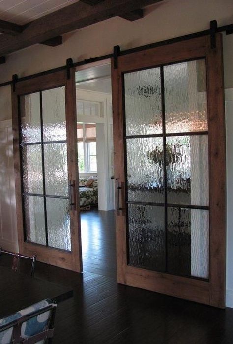 Rustic barn doors are the new rage when it comes to home decor. Couch Room, Divider Bookcase, Modern Barn Style, Macrame Room, Chinese Room, Track Door, White Couch, Bilik Mandi, Barn Door Designs