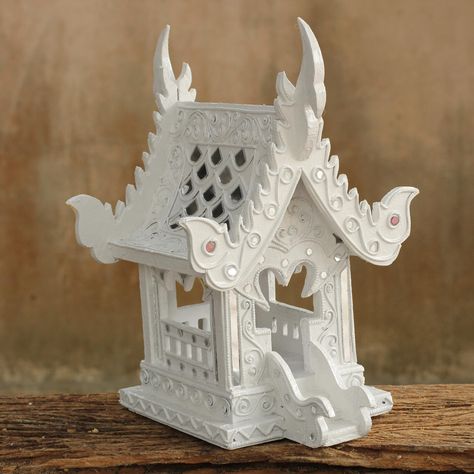 This handmade creation is offered in partnership with NOVICA, in association with National Geographic.   Jaifah Aksornsri finds inspiration in the architectural styles of ancient Lanna temples for the design of this spirit house. Asian Temple, House Sculpture, Spirit House, White Temple, Wood Spirit, Architectural Styles, Mantel Decorations, Boho Chic Decor, Fairy Houses