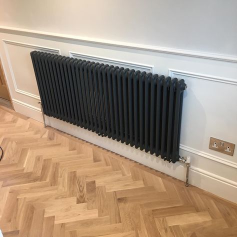 What an absolute treat this gorgeous snap is! We're huge fans of column radiators and this matt black beauty only adds to our obsession. We LOVE 🙌🏻 - 📸: @renovatingaragonhouse via Instagram Hallway Ideas Black, Long Hallway Ideas, Bedroom Radiators, Radiators Living Room, Kitchen Radiator, Black Radiator, Victorian Hallway, Home Radiators, Column Radiator