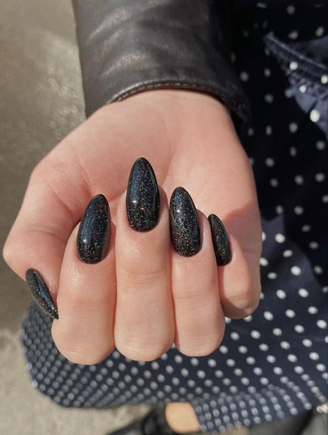 Black Nails With Gold Sparkles, Almond Nails Alternative, Black Galaxy Nails Acrylic, Light Black Nails, Shimmery Black Nails, Reputation Themed Nails, Black Sparkling Nails, Black Sparkle Nails Almond, Black Sparkle Nails Acrylic