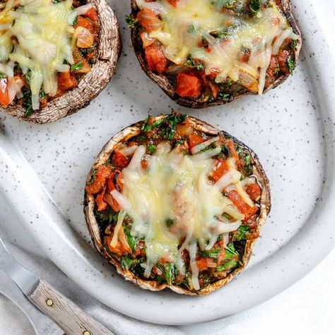 These mini mushroom pizzas are soo good! I can eat them all the time! Think of them like super healthy bagel bites that are low carb and ready in under 30 minutes! | Plant-Based on a Budget Ella Vegan, Portobello Mushroom Pizza, Portobello Pizza, Healthy Bagel, Vegan Stuffed Mushrooms, Plant Based Pizza, Stuffed Portobello Mushrooms, Pizza Vegana, Stuffed Portobello