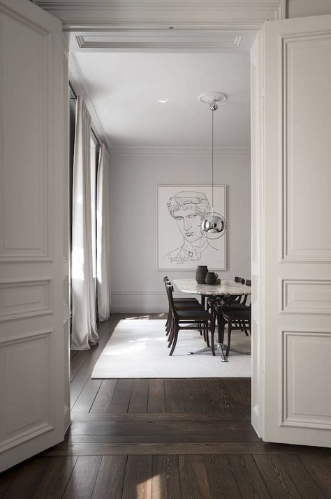 T.D.C: Heritage Architecture Meets Iconic Design in a Stockholm Apartment Stockholm Apartment, Hardwood Floors Dark, White Interiors, Dark Floors, Century Home, Dark Wood Floors, 아파트 인테리어, Floor Colors, Turn Of The Century