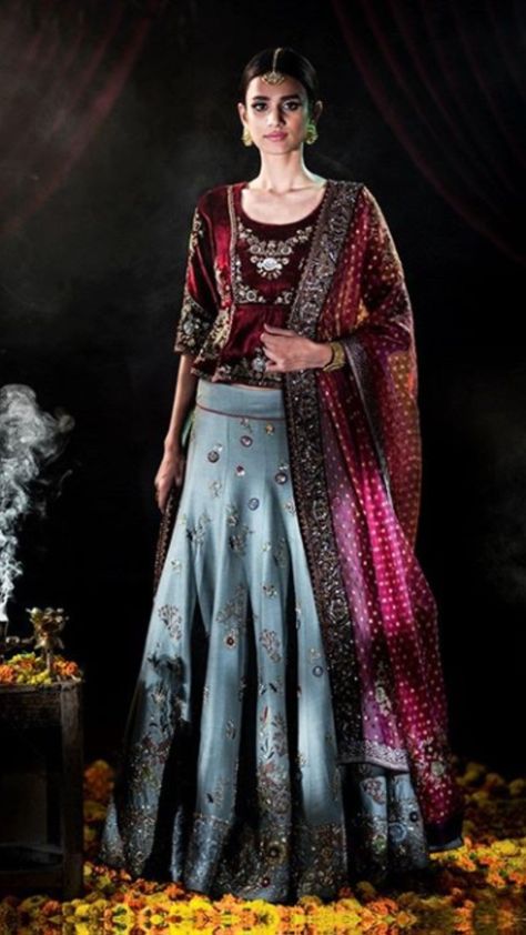 Beautiful Raw Silk Lehenga  and velvet peplum blouse top.  Embellished with hand embroidery work and paired with net dupatta. #Lehenga #traditional #festival #handembroidery #anjumodi #traditional #festival #handembroidery Lehenga Traditional, Traditional Festival, Hand Embroidery Work, Raw Silk Lehenga, Lehenga Skirt, Indian Brides, Silk Lehenga, Net Dupatta, Peplum Blouse