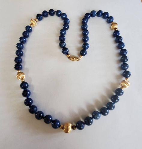 "Vintage 14k Gold and Blue Sodalite Bead Necklace Charming 90s 14k Yellow Gold beads and blue sodalite knotted necklace Good Condition, some of the small gold beads do have age patina Hallmarked 14k Necklace measures 22\" end to end, the sodalite beads measure about 8mm, the Gold beads are 8.40mm Pretty beads! Thanks for Shopping!" Sewing Jewelry, Knotted Necklace, Yellow Necklace, Necklace Bead, Pretty Beads, Blue Sodalite, Gold And Blue, Retro Jewelry, Knot Necklace