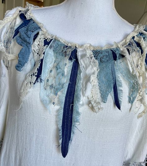 This Upcycled dress was created from a shirt and a denim skirt. I adorned it with lots of lace and handmade denim feathers. Size medium Denim Feathers How To Make, Denim Dream Catcher, Upcycled Denim Feathers, Spring Dresses In Upcycled Fabric, Denim Feathers, Bohemian Upcycled Spring Dress, Dress Upcycle, Upcycled Dress, Patchwork Clothes